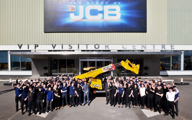 JCB Apprentices celebrate after the reveal of the Loadall Built by Apprentices