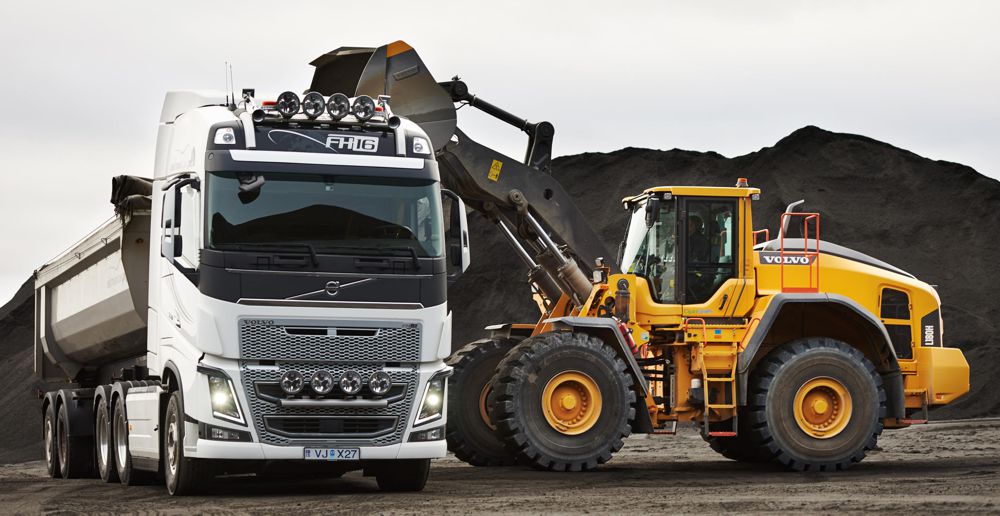 A Volvo L180H loads basalt into a Volvo FH16, Volvo’s most powerful truck, before it is distributed across Iceland.