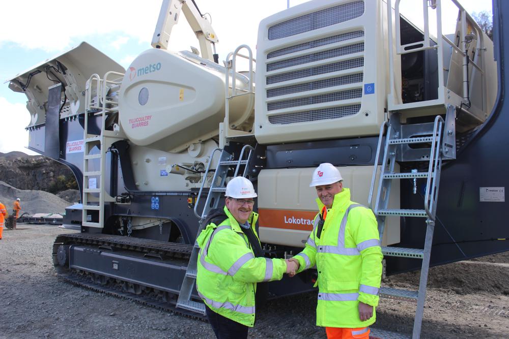 Mr. David Strachan, Quarry Manager Northfield Quarry, Tillicoultry Quarries, received the keys from Mr. Michael Broe, Director, Garriock Bros. Ltd. 