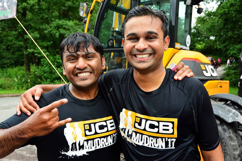 Engineers Dhanraj Veer, 28, and Ajay Mahajan were visiting the UK from JCB's factory in Pune, India and decided to take part in the JCB MUD RUN.