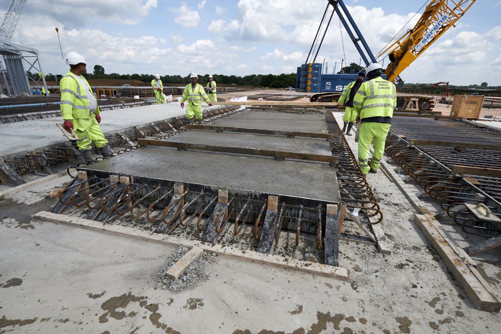 bridge deck concrete panels being cast at the on-site casting plant near the Brampton compound