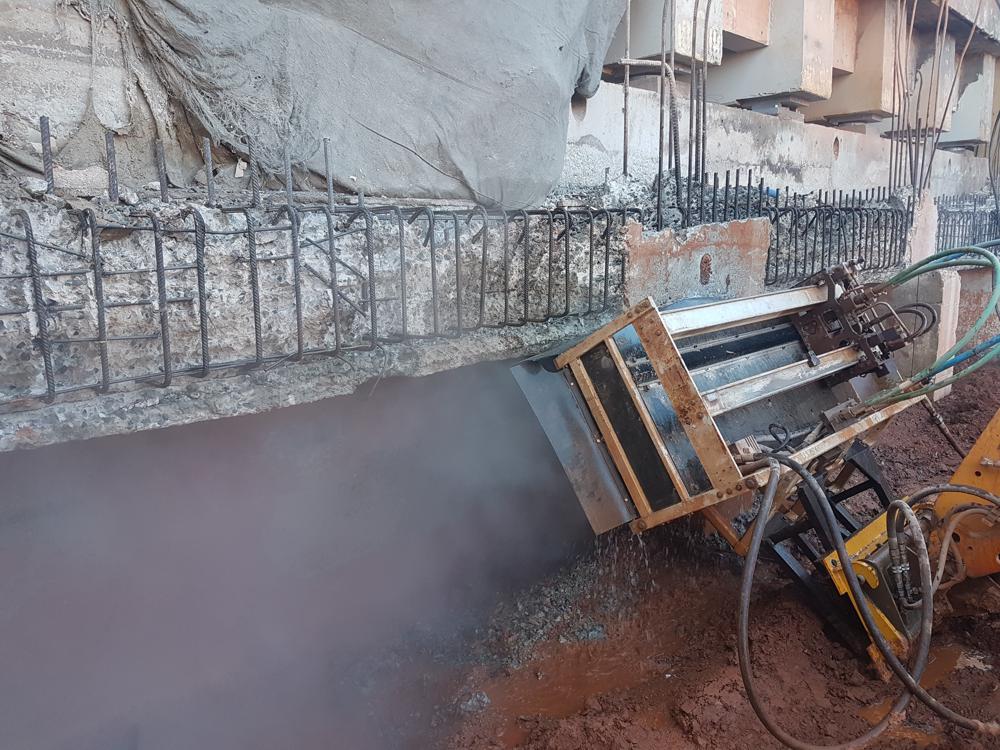 Hydrodemolition technology was employed to remove deteriorated concrete from the structures without any damage to existing steel reinforcement