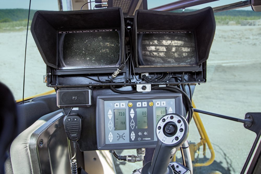 The Wirtgen camera system is installed to optimize selective mining. Two cameras, mounted on the left and on the right behind the cutting drum, transmit 1:1 photos of the surface to a double monitor in the cabin, allowing the Surface Miner operator to exactly adjust the cutting depth.