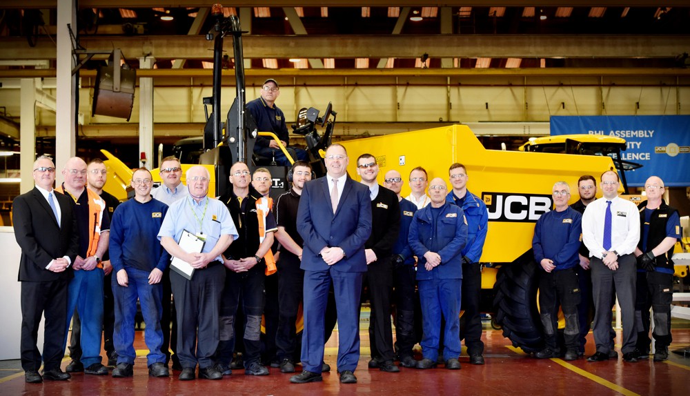 Employees from the site dumper production line at the JCB World HQ in Rocester, Staffordshire, where the first machines are now being produced.