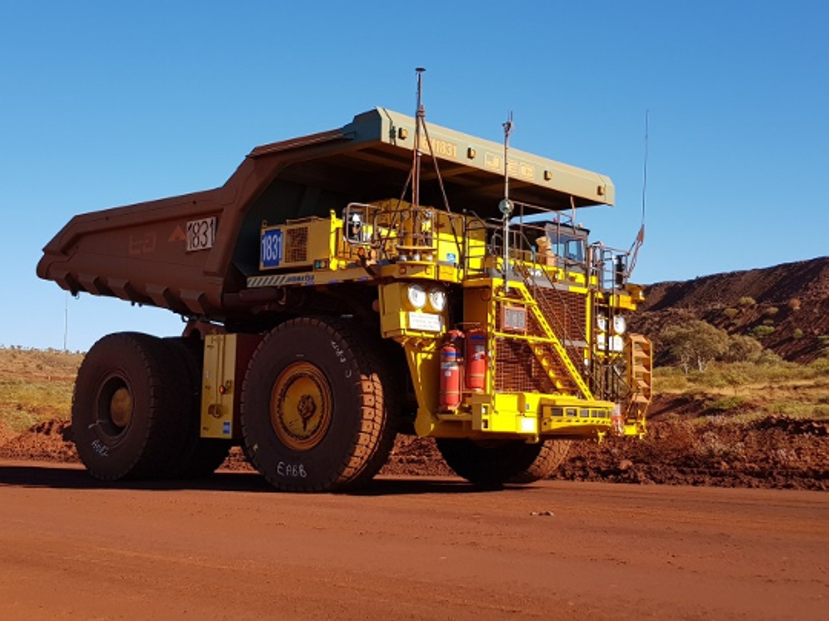 A standard truck 830E with the AHS retrofit kit running in autonomous mode at Rio Tinto’s mine in Australia