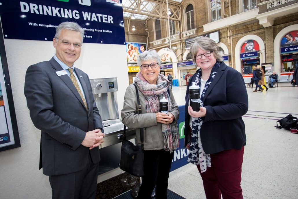 First water fountain user at London Charing Cross is Sheila Pearce of Chislehurst. Also pictured Network Rail's chief executive Mark Carne and Thérèse Coffey MP, Parliamentary Under Secretary of State at DEFRA