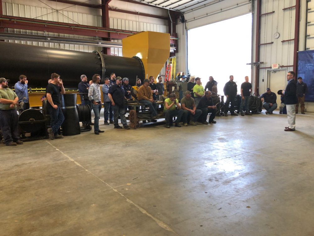 U.S. Representative Jim Banks holds a question-and-answer session with Asphalt Drum Mixers employees. Workers brought up topics important to them, including steel tariffs and the farm bill. Image courtesy of Asphalt Drum Mixers
