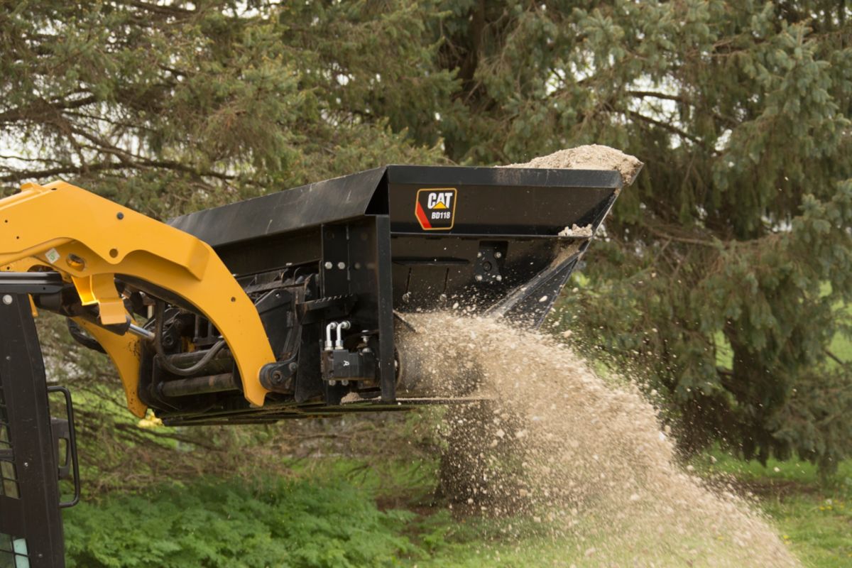 Cat heavy-duty side discharge buckets deliver controlled flow of loose materials