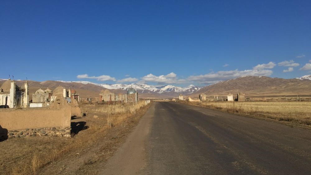 A view of the existing road along the North–South Alternate Corridor in Kyrgyz Republic. The road passes some historic burial structures, which will be conserved and protected during construction of the new road. ADB’s Safeguard Policy addresses environmental and social risks in development projects and seeks to minimize and mitigate, if not avoid, adverse project impacts.