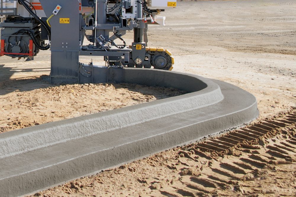 Fox is able to utilize existing mold inventory, mating them to the Wirtgen slipform paver SP 15i.