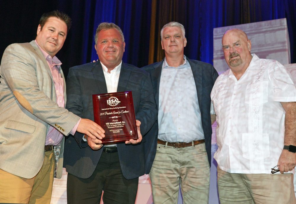 From left: Matthew Ferguson, VSS International, Inc. (VSSI), accepts the 2019 President's Award from ISSA President Rex Eberly, along with VSSI's Jeff Roberts and Jeffrey Reed. Photo by Tom Kuennen, courtesy of FP2.