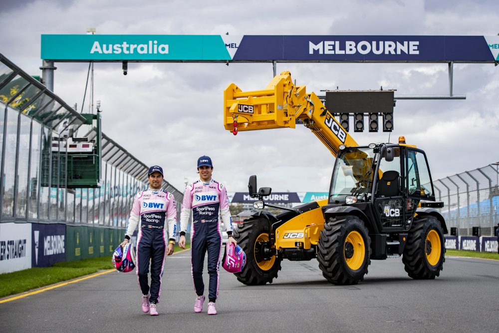 SportPesa Racing Point F1 drivers Sergio Perez (left) and Lance Stroll pictured with a JCB Loadall